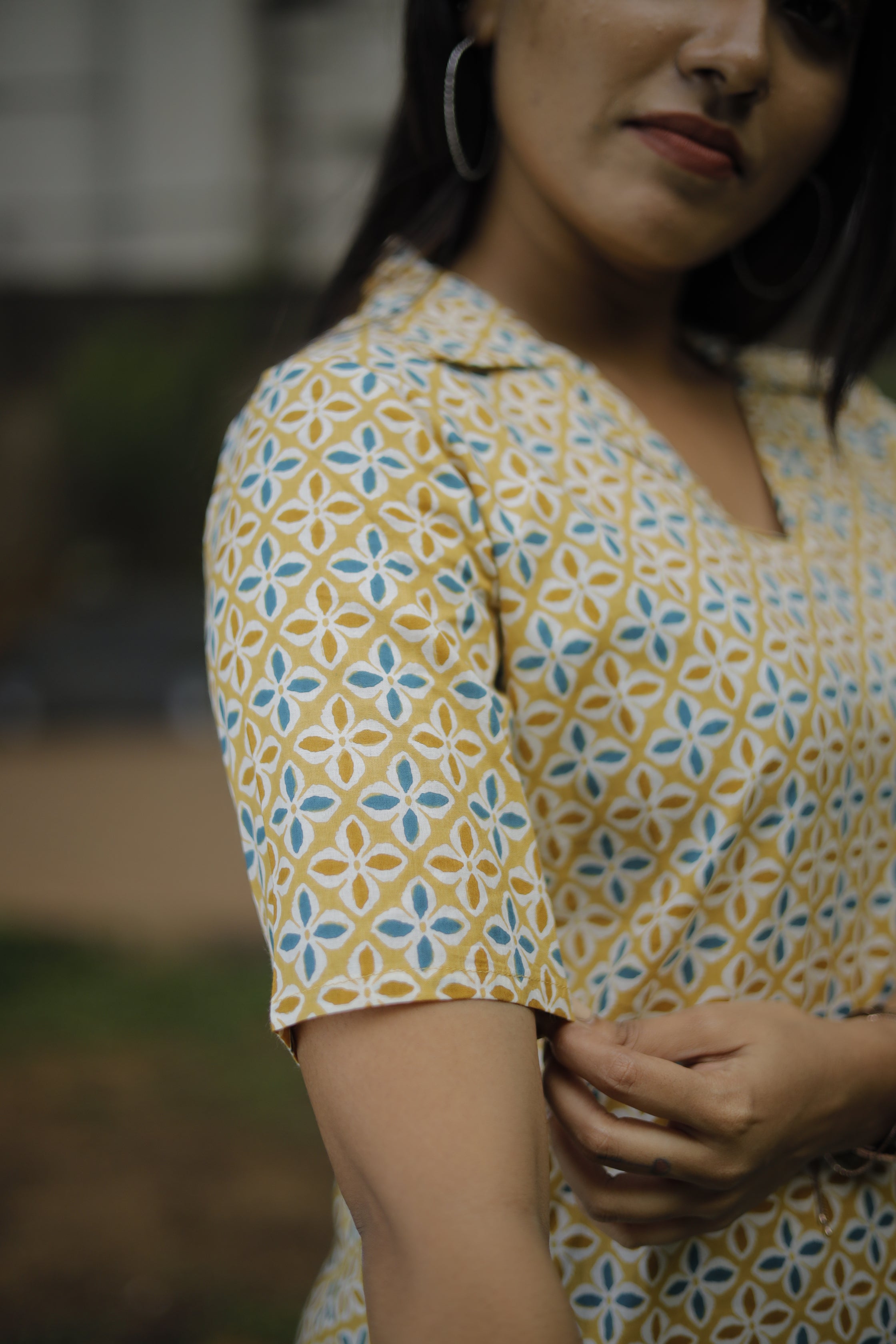 floral motif printed cotton kurti in yellow and blue