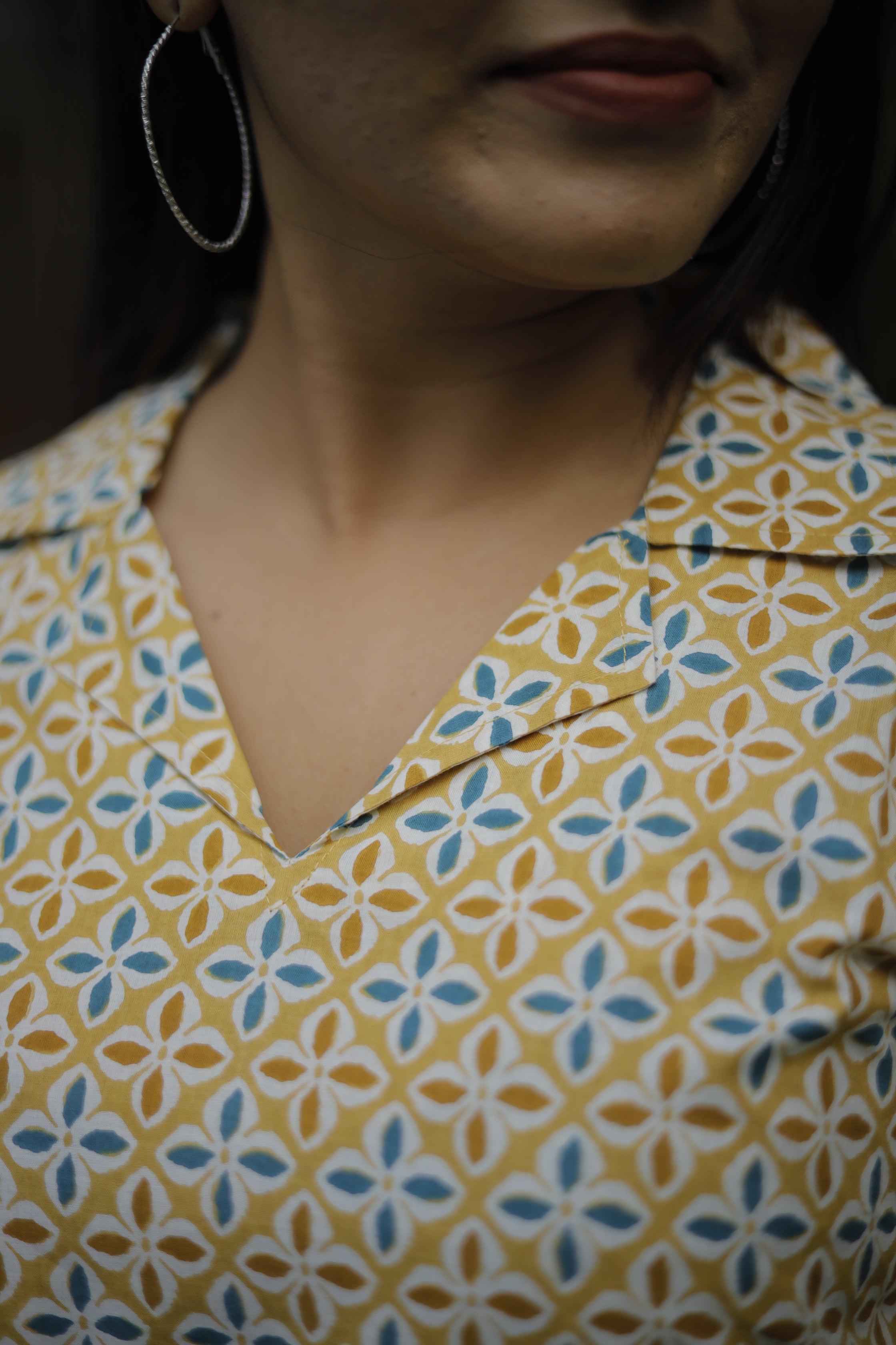 floral motif printed cotton kurti in yellow and blue